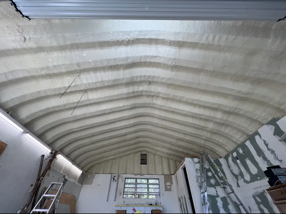 Spray polyurethane foam applied to the underside of a metal roof deck in Elk Grove Village